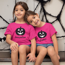 キュートなカボチャの名前入りホットピンクの女の子のハロウィン Tシャツ