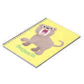 キュートなサーベル歯付きタイガー・スミロドン漫画 ノートブック (左側)