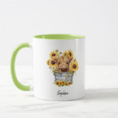 キュートなハイランドカウインバケツヒマワリフローラ マグカップ (左)