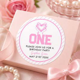 キュートなピンクのリボンのコケッティー1歳の誕生日 ラウンドシール