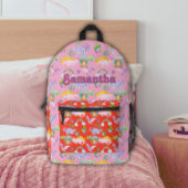 キュートな恐竜と虹 プリントバックパック