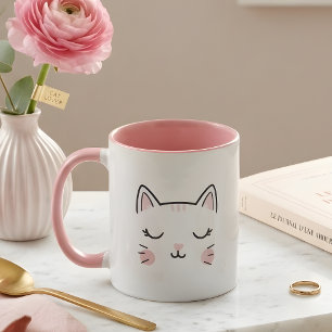 キュートな眠そうな子猫の顔 ピンクと白のマグカップ マグカップ