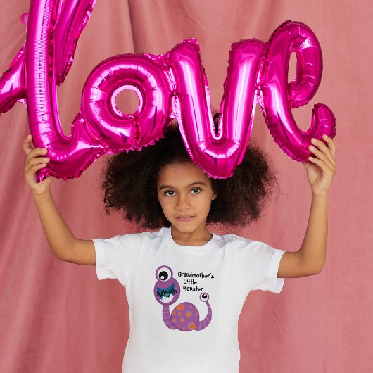 キュートな紫色のサイクロプスモンスタおもしろいーおもしろい子供へ Tシャツ