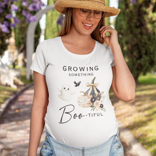キュートな「何かがすくすく育ってます」マタニティー Tシャツ