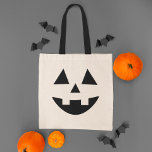 キュートハロウィーンのカボチャのちょうちんカボチャ顔ハロウィン トートバッグ<br><div class="desc">この祝かわいいカボチャ顔トートバッグとスタイルでハロウィン。このおもしろいハロウィーンのカボチャのちょうちんデザインは嬉しい歯の笑顔を！</div>