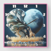キリンはアフリカの月に照らされたサバンナを見つめている スクエア壁時計 (正面)