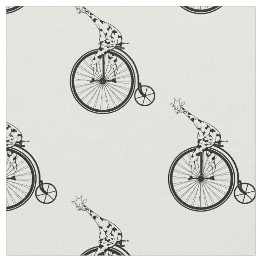 キリンは1ペニーの農耕自転車に乗っている ファブリック (クローズアップ)