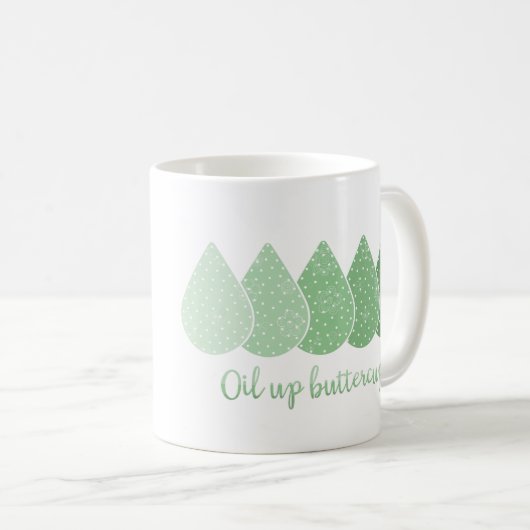 キンボウゲのマグ(緑)の上の油 コーヒーマグカップ (正面右)