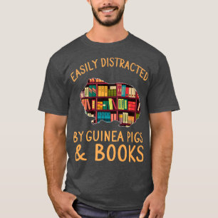 ギニアおもしろい豚と書籍の値リストに容易に気を取られる Tシャツ