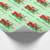 ギフトで満ちている飛行機を飛ばしているサンタクロース ラッピングペーパー (角)