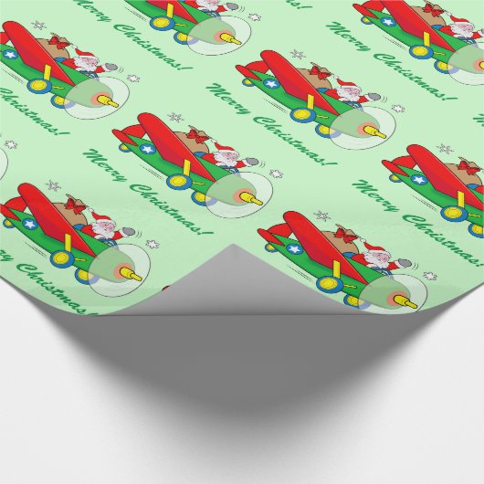 ギフトで満ちている飛行機を飛ばしているサンタクロース ラッピングペーパー (角)
