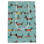 ギフトとそりパターン付きホリデーダックスシャンド ミディアムペーパーバッグ (裏面)