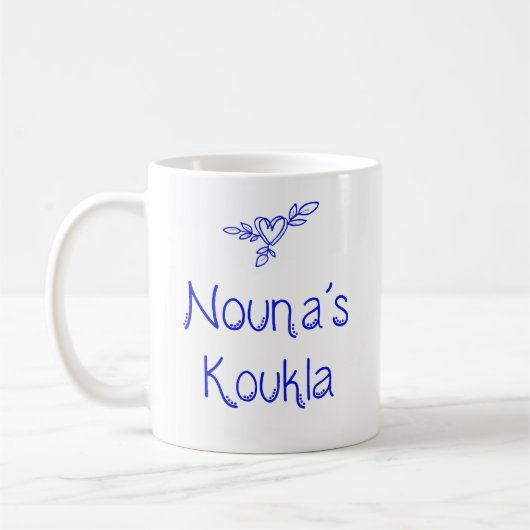 ギリシャのNouna's Kouklaマグカップ コーヒーマグカップ (左)