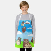 クッキー飛んでいるバルーンに子ども用の料理ベーキング エプロン (着用した状態)