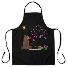 クマは咲く木と鳥を観察する