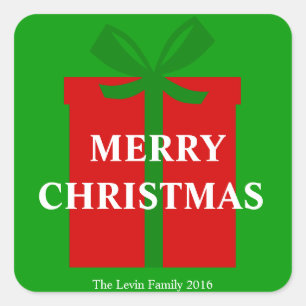 クラシックで赤いギフト用の箱の緑のリボンのメリークリスマス スクエアシール