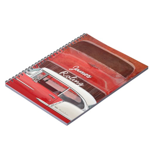 クラシックな車のChevy Bel Airの赤く白いヴィンテージのごまかし ノートブック (左側)