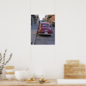 クラシックの古い赤いプジョー車が通りに駐車 ポスター (キッチン)