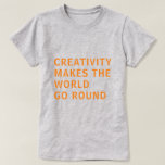 クリエイティブクリエイティビティ引用文オレンジタイポグラフィグレー Tシャツ<br><div class="desc">クリエイティブ用のTシャツは、灰色の背景にオレンジ色のタイポグラフィで文字「創造性ははっきりした世界を動かす」を特徴としている。Happy Dolphin Studio専用。おもしし救済連絡、お客様の製品をお楽しみください。</div>
