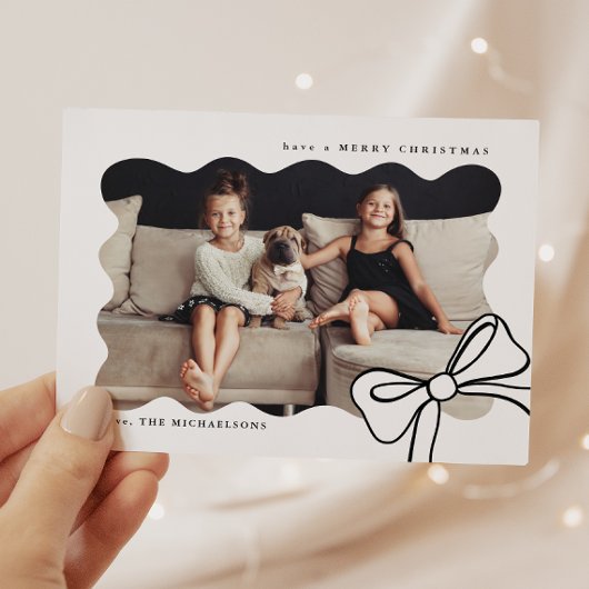 クリスマシンプルスの弓の白黒の写真 シーズンカード