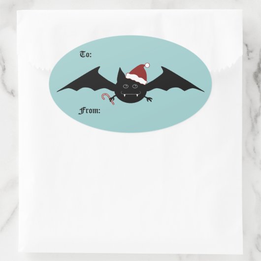 クリスマスおもしろいこうもりの発向 楕円形シール (バッグ)