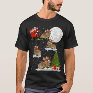 クリスマスおもしろい照明ツリーサンタライディングラビットクリス Tシャツ