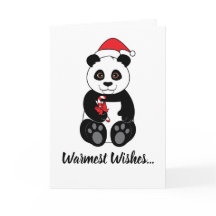 クリスマスにキャンディーケーンを食べるパンダ