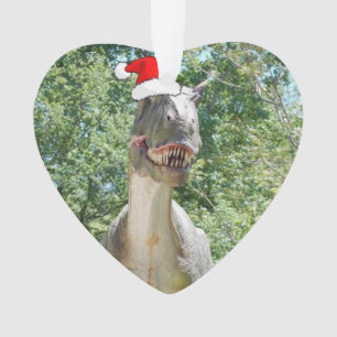 クリスマスにサンタクロースの帽子をかぶった恐竜 オーナメント