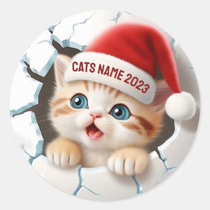 クリスマスにサンタ帽子をかぶったかわいい子猫 ラウンドシール