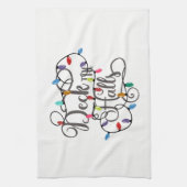 クリスマスにホールの休日のライトを飾る キッチンタオル (縦)