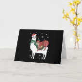 クリスマスにラクダに乗るナマケモノ カード (黄色い花)