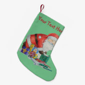 クリスマスに向けて準備をしているかわいい笑顔のサンタ スモールクリスマスストッキング (正面 (吊り時))