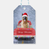 クリスマスに座っている雪の中のドイツの羊飼い犬 ギフトタグ (裏面)