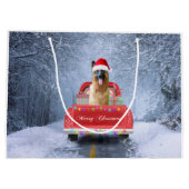 クリスマスに座っている雪の中のドイツの羊飼い犬 ラージペーパーバッグ (裏面)