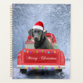 クリスマスに座って雪の中の黒いラブラドールの犬 プランナー手帳 (正面)