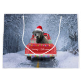 クリスマスに座って雪の中の黒いラブラドールの犬 ラージペーパーバッグ (正面)