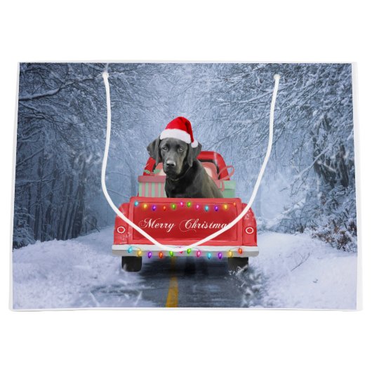 クリスマスに座って雪の中の黒いラブラドールの犬 ラージペーパーバッグ (正面)