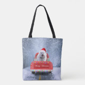 クリスマスに座る雪の中のアメリカのエスキモー犬 トートバッグ (裏面)
