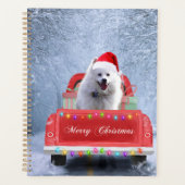 クリスマスに座る雪の中のアメリカのエスキモー犬 プランナー手帳 (正面)