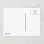 クリスマスに暖炉によって坐っている2人の女の子 シーズンポストカード (裏面)