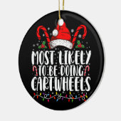 クリスマスに最もありそうな、逆立ちしながらマッチングする セラミックオーナメント (左)