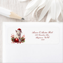 クリスマスに服を着た小さな子猫 ラベル