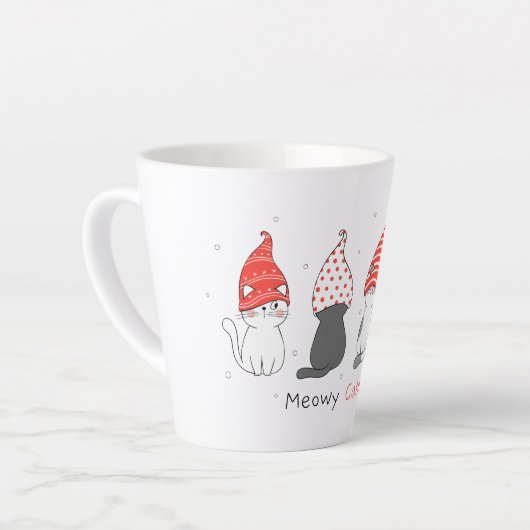 クリスマスに格言帽子をかぶったかわいい猫。 カフェラテマグ (左アングル)
