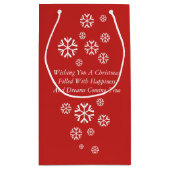 クリスマスに着替えたかわいい黒と茶色の子犬 スモールペーパーバッグ (裏面)