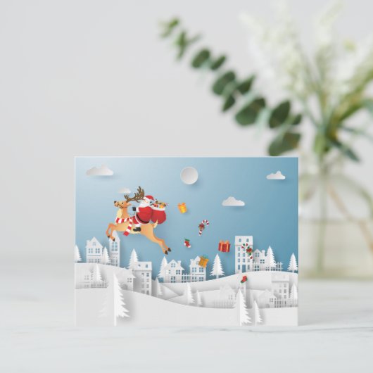 クリスマスに贈り物を届ける紙で切ったサンタ ポストカード (スタンド正面)