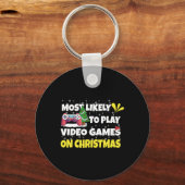 クリスマスに遊ビデオゲームをする可能性が最も高おもしろいい キーホルダー (正面)