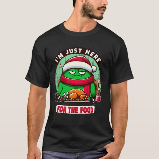 クリスマスのお楽しみは食べることだけ Tシャツ (正面)