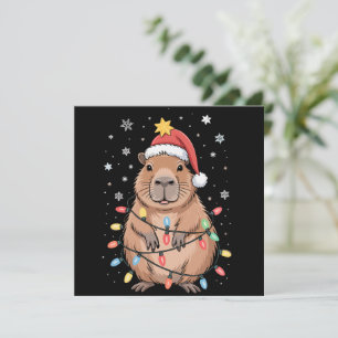 クリスマスのカピバラ サンタ帽子 クリスマスライト ツリー シーズンカード