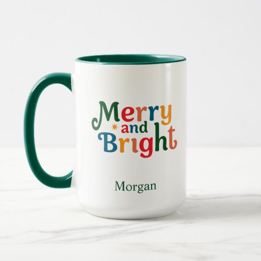 クリスマスのカラフル merry and bright 名前入り マグカップ (左)