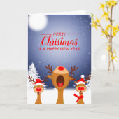 クリスマスのキャロル歌トナカイのクリスマス カード (黄色い花)